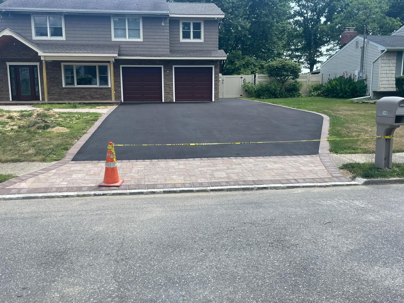 Sealed asphalt driveway on a Suffolk County home